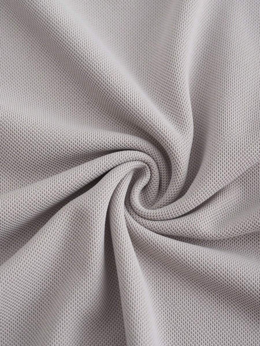 Polo pour homme en polyester à coupe classique avec détail de boutons