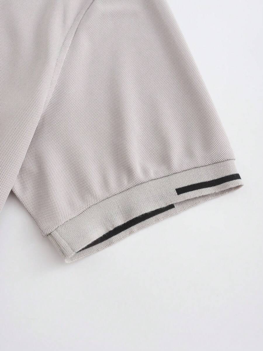 Polo pour homme en polyester à coupe classique avec détail de boutons