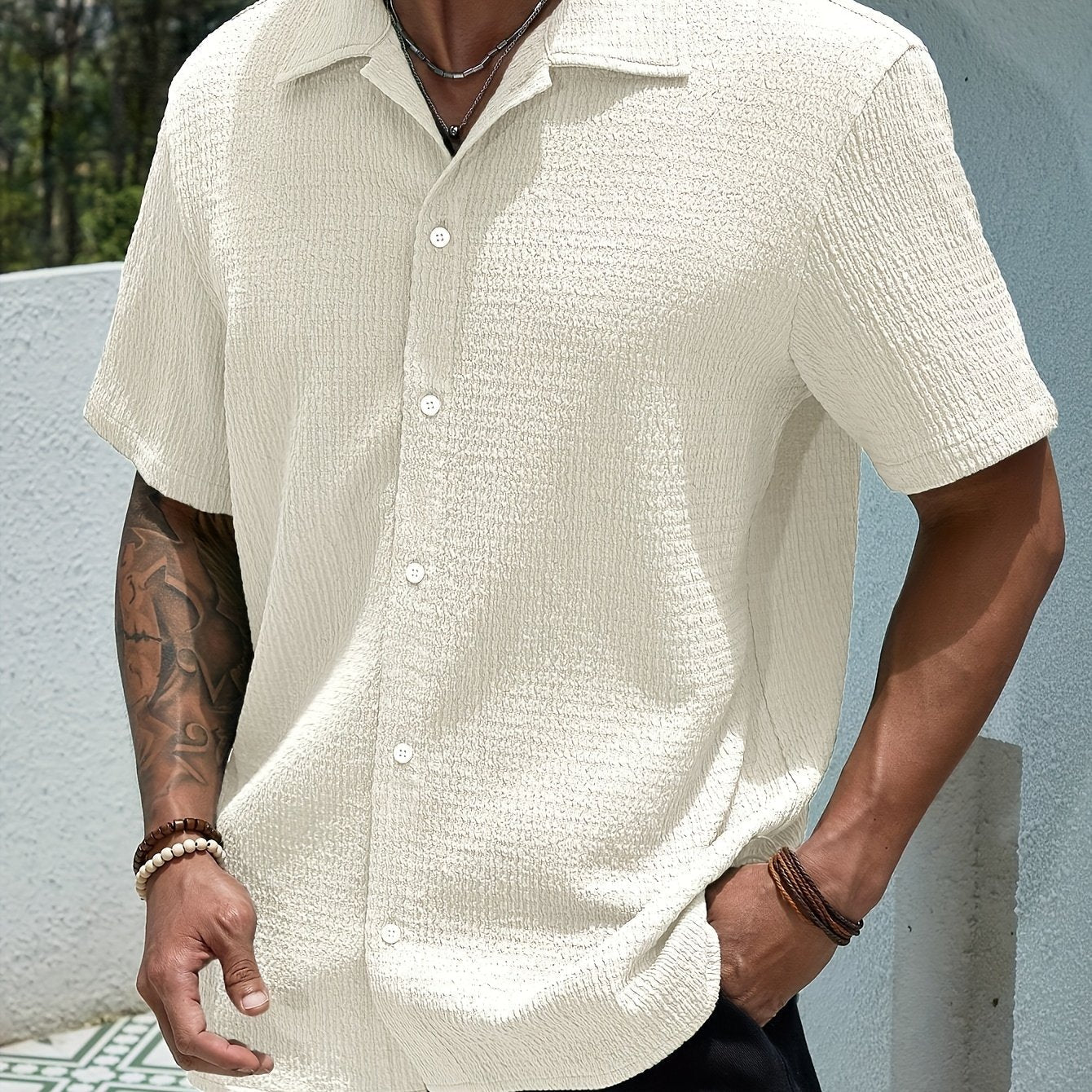 Chemise de printemps pour homme à col classique en tissu léger uni