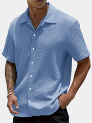 Chemise de printemps pour homme à col classique en tissu léger uni